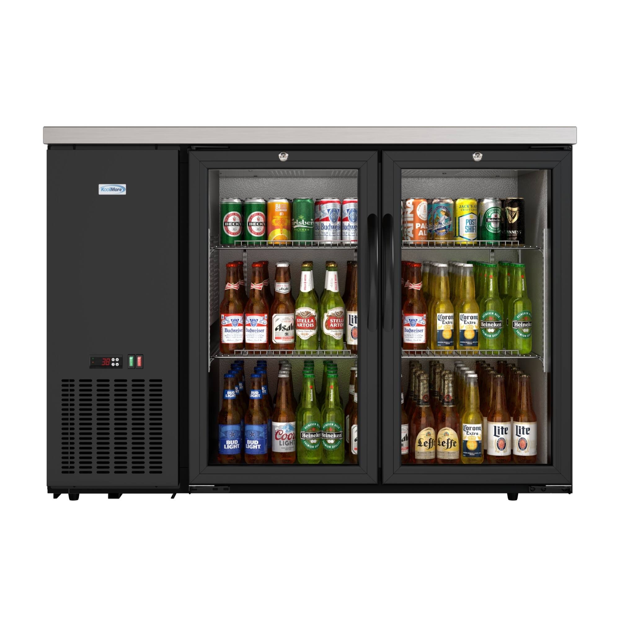 The image features a refrigerator with a variety of beer bottles inside. There are at least 13 bottles visible, with different shapes, sizes, and colors. The refrigerator is filled with a diverse selection of beers, making it an appealing choice for those who enjoy a wide range of beverage options.