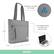 The image features a gray Solo laptop bag with a fully padded laptop compartment that fits up to 15.6 inches. The bag is made from recycled PET bottles and has a size of 15.24 inches. The bag also has a 4.25-inch zippered pocket and a 14-inch laptop compartment.