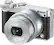 Left. Nikon - 1 J5 Mirrorless Camera with NIKKOR 10-30mm f/3.5-5.6 PD Zoom Lens - Silver.