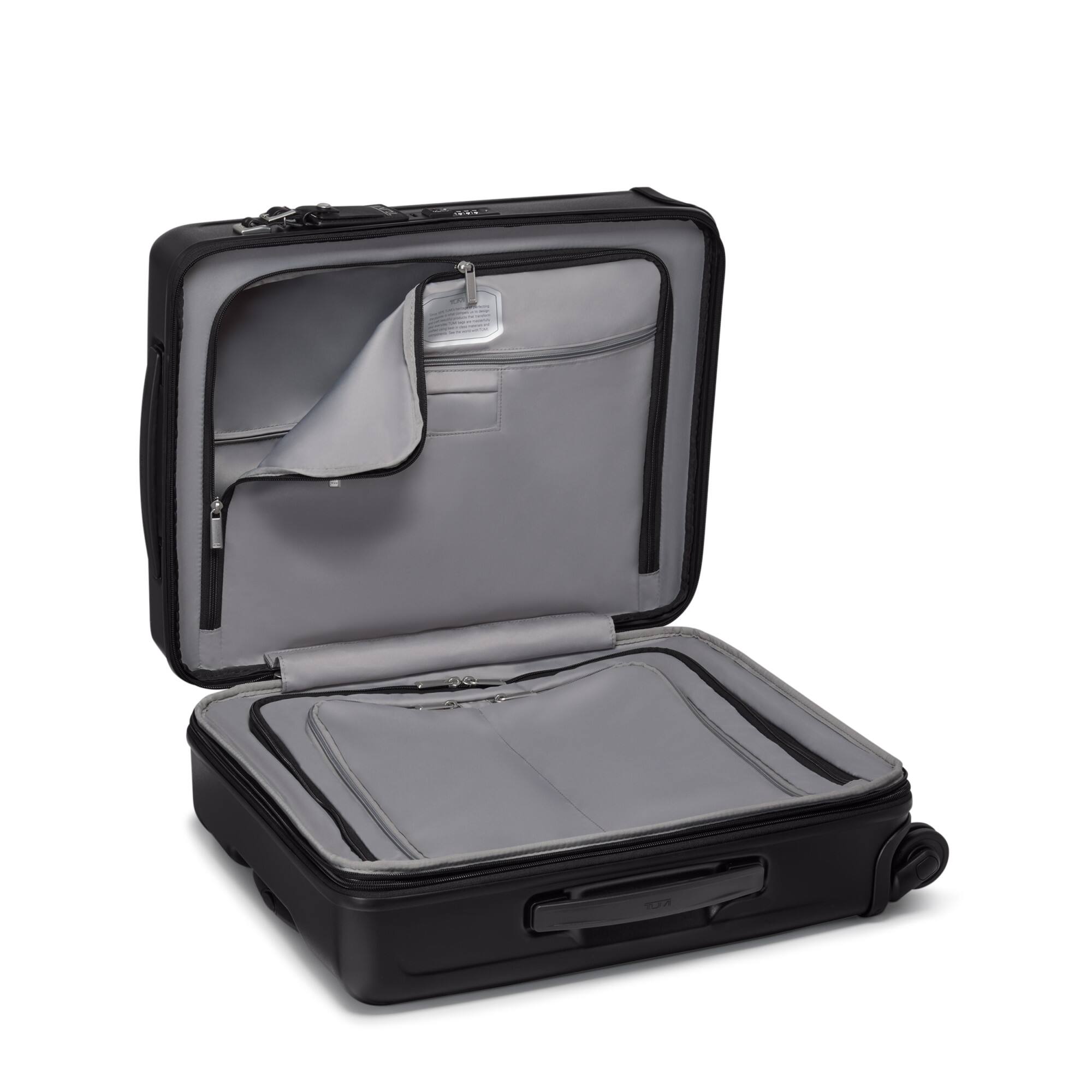 Angle. TUMI - Ventra Large Expandable Carry-On Spinner Suitcase - Black Texture.
