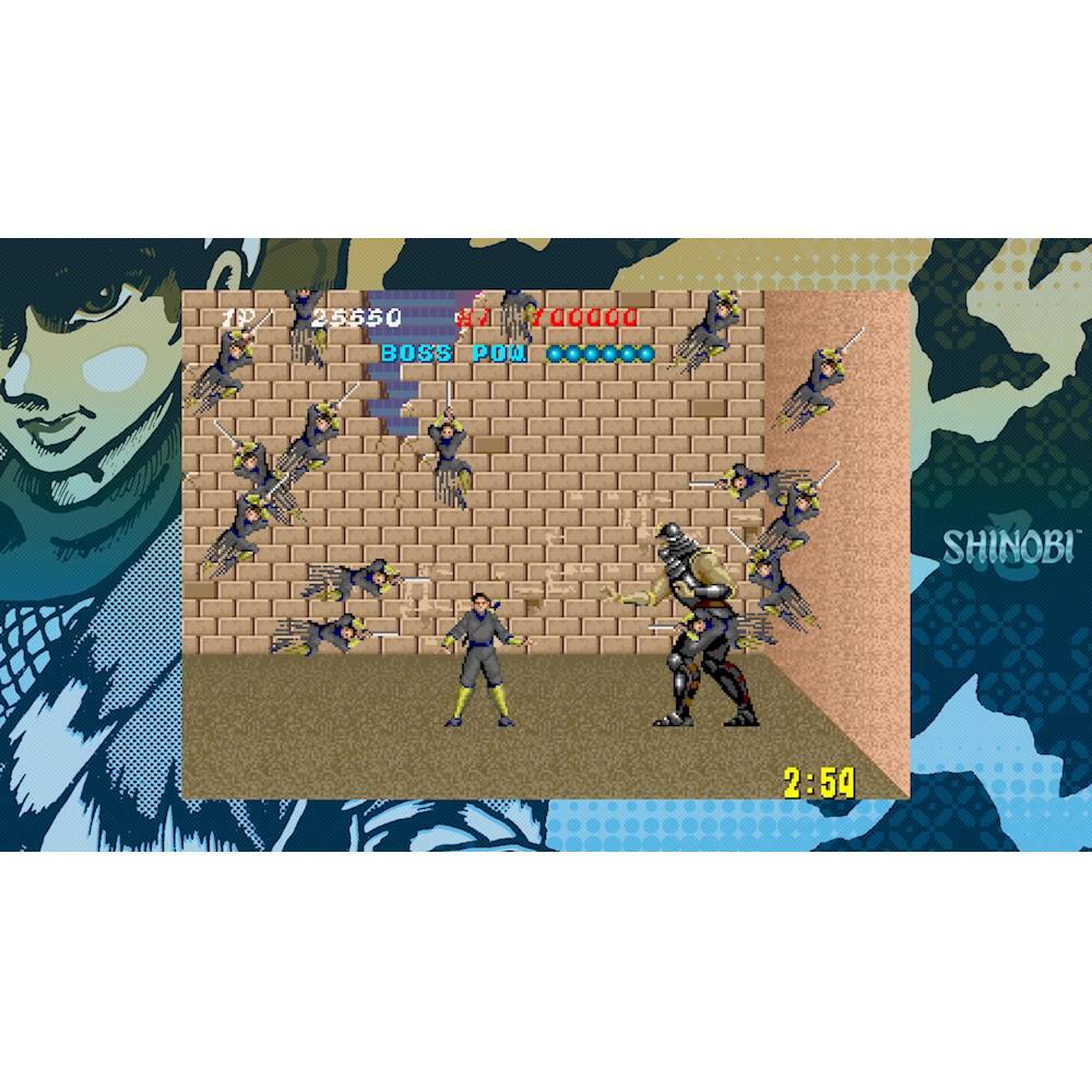The image features a video game with a character in a black suit and yellow pants, surrounded by other characters. The game is titled Shinobi, and it appears to be a fighting game with various characters engaged in combat. The time displayed on the screen is 2:54.