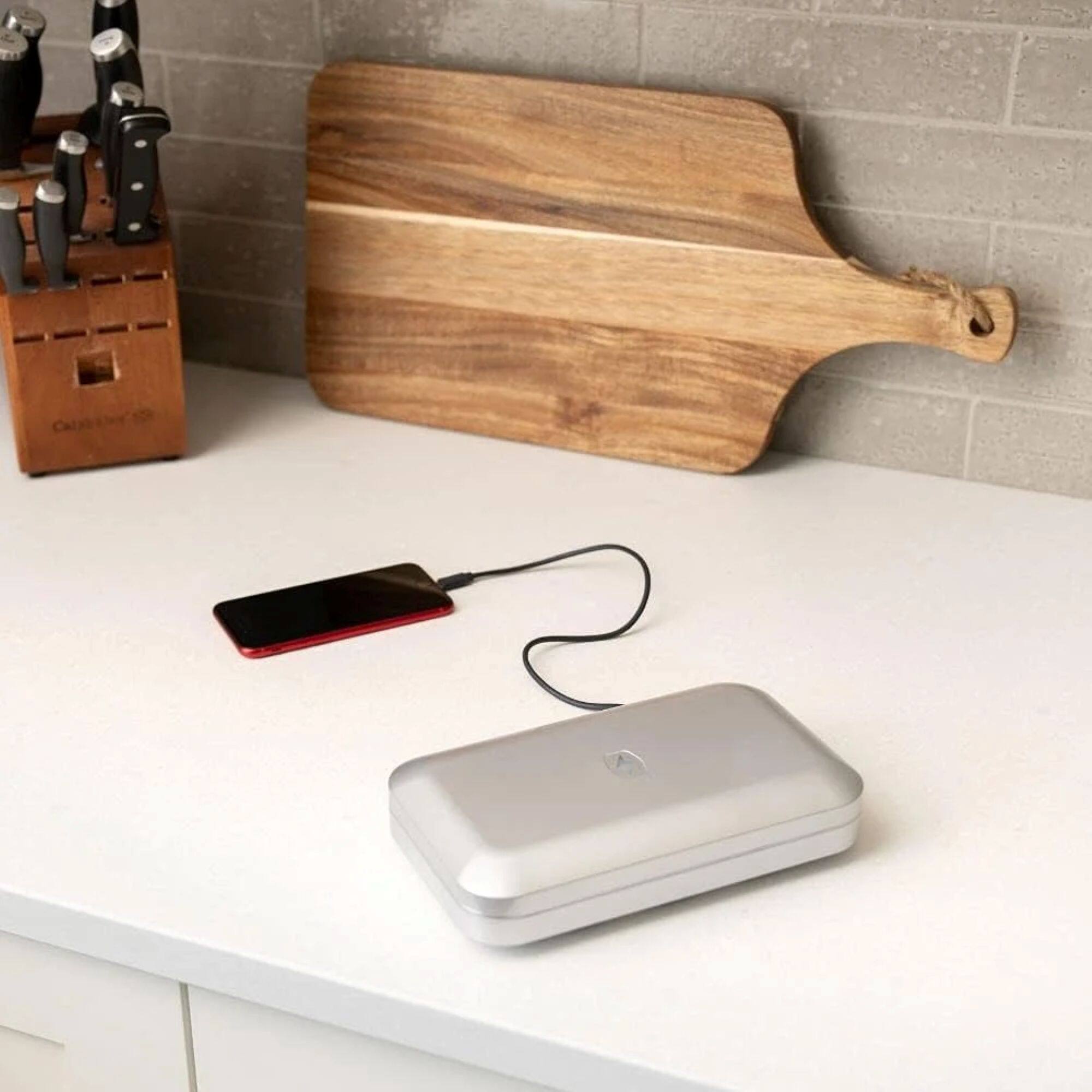 Left. PhoneSoap - PhoneSoap Charging Cable, Apple, Compatible with iPhones and iPads (6 Foot, USB-C to Lightning) - Black.