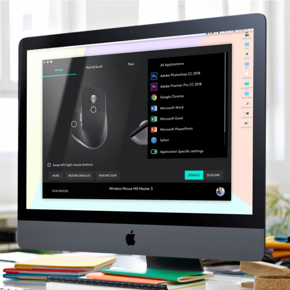 The text on the image is grouped and corrected as follows:
Mouse Point & Scroll Flow All Applications Photoshop CC 2018 Ps Adobe Premiere Pro CC 2018 Adobe Google Chrome Microsoft Word I Microsoft Excel Microsoft PowerPoint Safari Application Specific settings Swop left/right mouse buttons MORE RESTORE DEFAULTS FEATURE TOUR DEFAUILT DUOLINK YOUR DEVICES Wireless Mouse MX Master 3