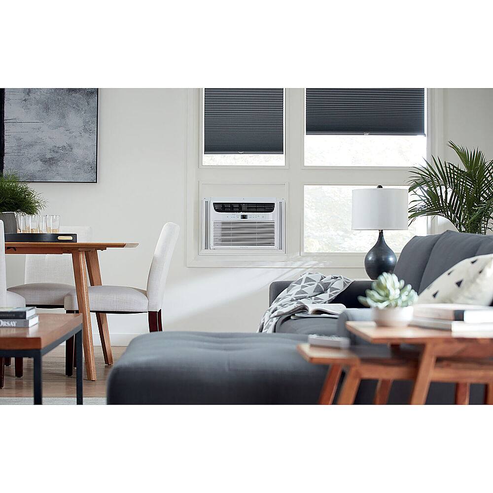 Left. Frigidaire - Energy Star 550 sq ft Window-Mounted Compact Air Conditioner - White.