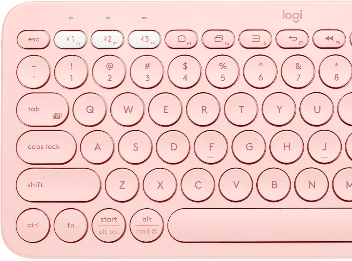 logi keyboard with pink case and white keys.