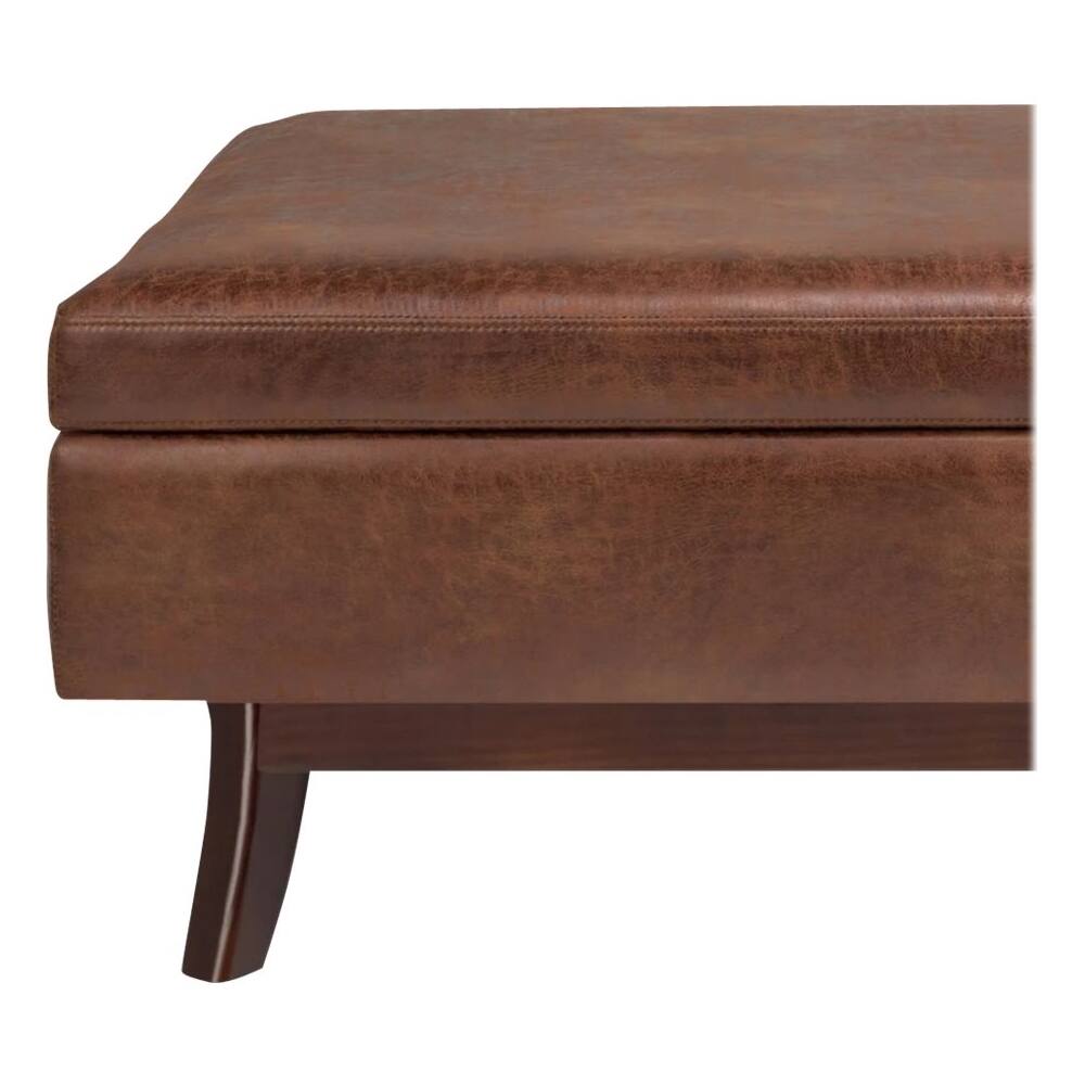 Alt View 13. Simpli Home - Owen Rectangular Mid-Century Modern High-Density Foam/Faux Air Leather Ottoman With Inner Storage - Distressed Saddle Brown.