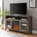 Alt View Zoom 12. Walker Edison - Tall Glass Two Door Soundbar Storage Fireplace TV Stand for Most TVs Up to 65" - Grey Wash.