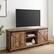 Alt View 13. Walker Edison - Rustic Farmhouse Sliding Door TV Stand for Most Flat-Panel TV's up to 78" - Rustic Oak.