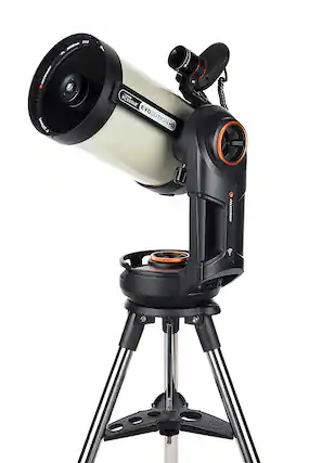 The image features a Celestron 6 telescope with a white lens. The telescope is mounted on a tripod stand, which provides stability and ease of use. The tripod stand has a black and orange design, adding a touch of color to the scene. The telescope is ready for use, offering a great opportunity for stargazing and observing celestial objects.