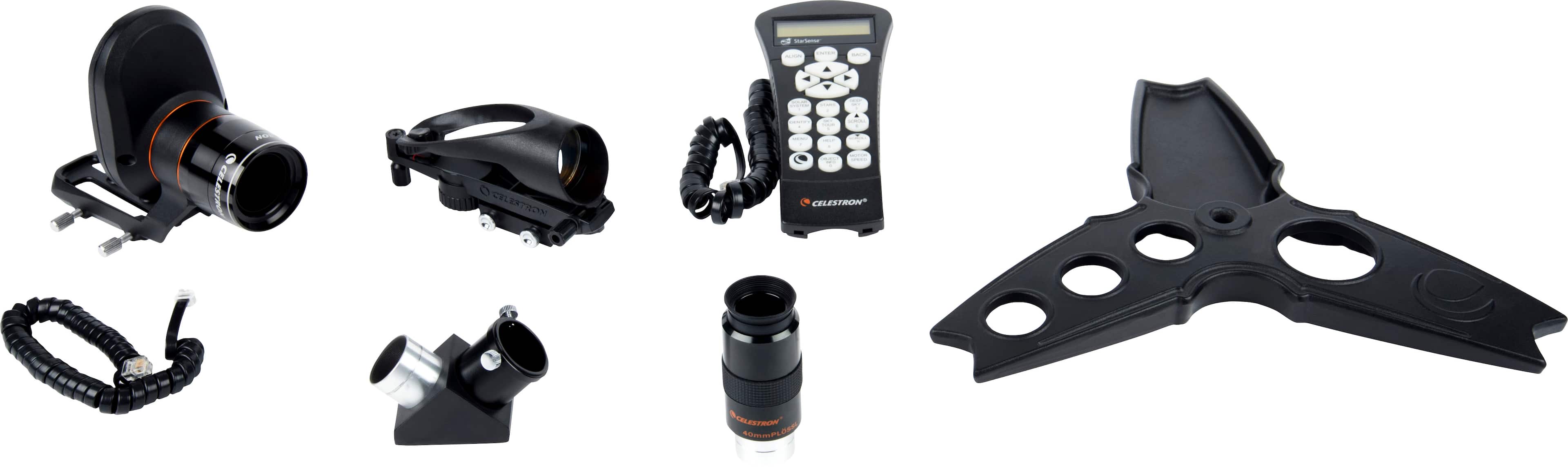 The image shows a collection of camera equipment, including a camera, lens, and remote control. The camera is positioned to the left, while the lens is located in the middle of the scene. The remote control is situated towards the right side of the image. The equipment appears to be for a telescope, as indicated by the presence of the lens and the remote control.