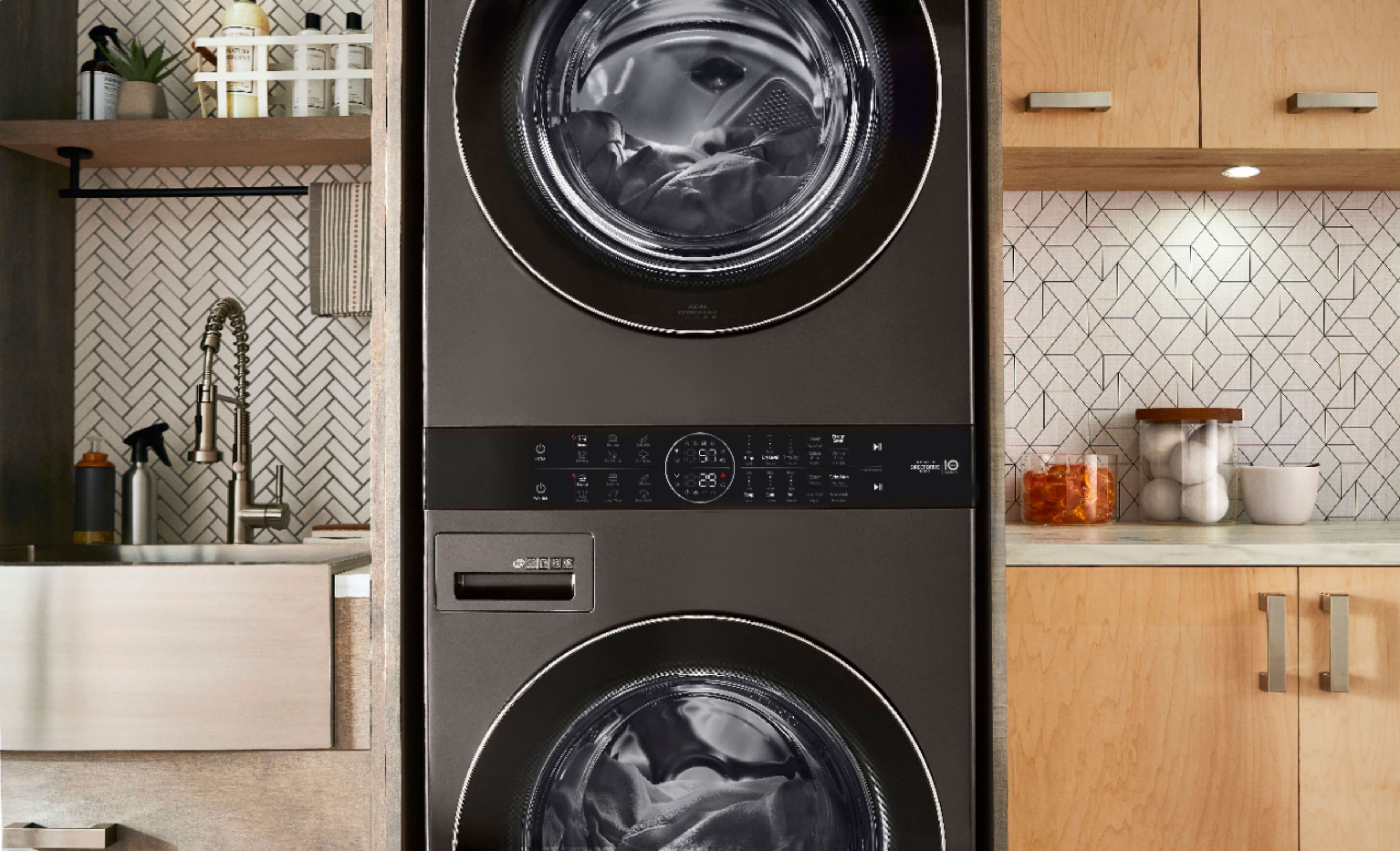 Silver LG Washer and Dryer Under Wood Countertop - Transitional