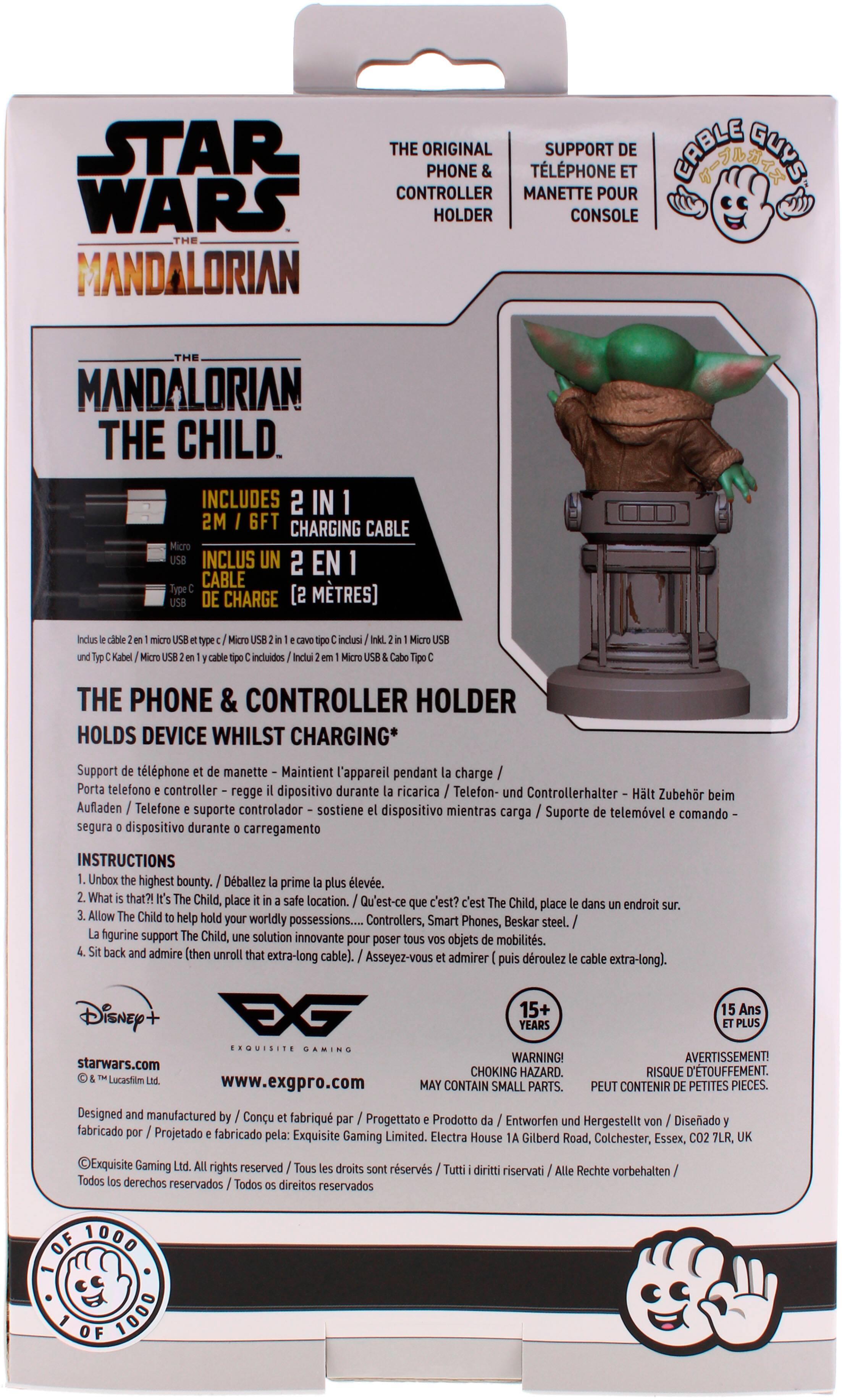 The image features a Star Wars Mandalorian The Child phone and controller holder. This product is designed to hold a phone and controller while charging. The holder is made of steel and has a unique design that allows it to hold both the phone and controller securely. The package includes a 6-foot charging cable, making it a convenient and practical accessory for fans of the Star Wars franchise. The product is made by Hasbro and is compatible with various devices, making it a versatile addition to any gaming setup.