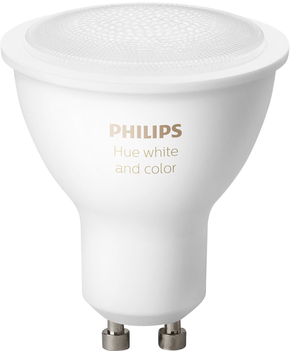 POV male hand holding new Philips Hue GU10 color lamp right after