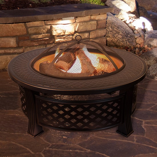 Wrought iron fire pit table deals