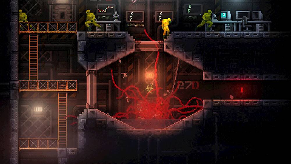The image shows a dark and bloody scene of a video game, with a character standing in a room filled with blood and gore. The character appears to be in the middle of a battle, surrounded by a group of enemies. There are multiple enemies in the room, some of which are positioned close to the character, while others are farther away. The room also contains a TV and a computer, adding to the overall atmosphere of the game.