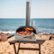Alt View Zoom 19. Ooni - Fyra 12 Inch Portable Outdoor Pizza Oven - Silver.