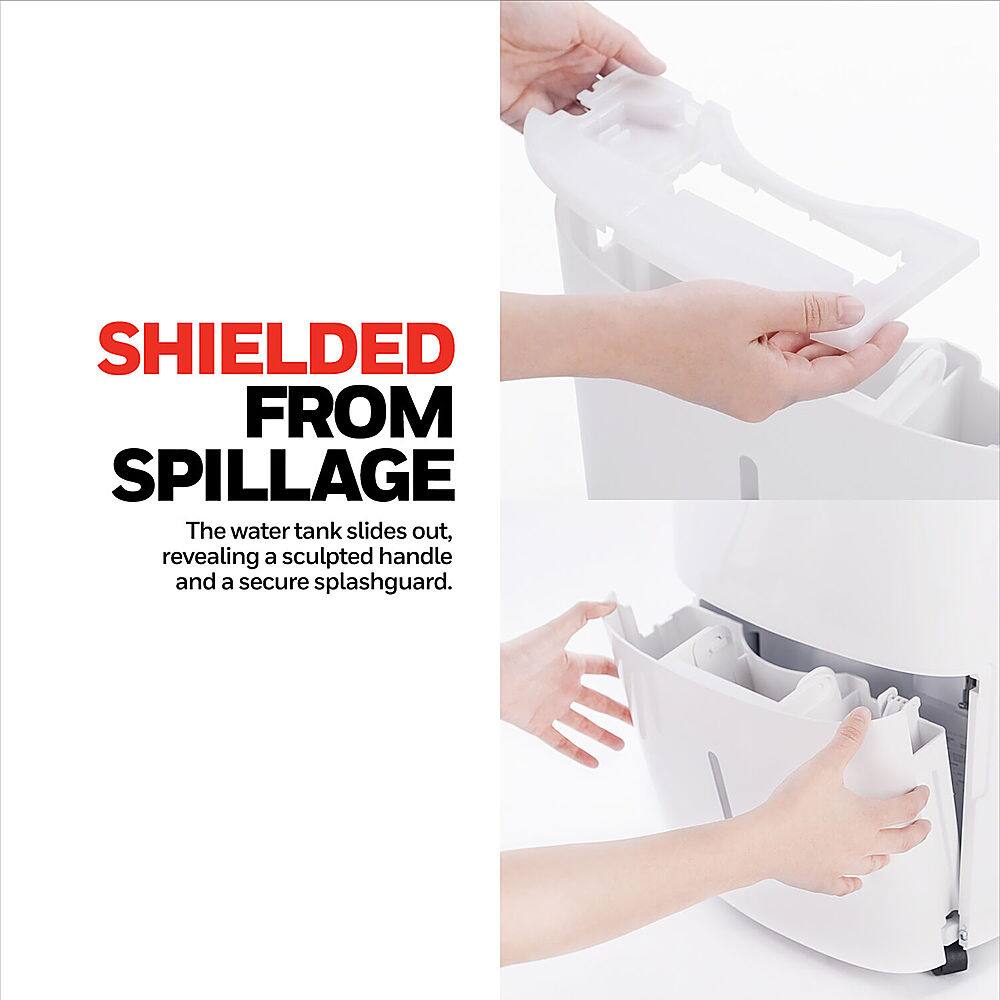 SHIELDED FROM SPILLAGE: The water tank slides out, revealing a sculpted handle and a secure splashguard.