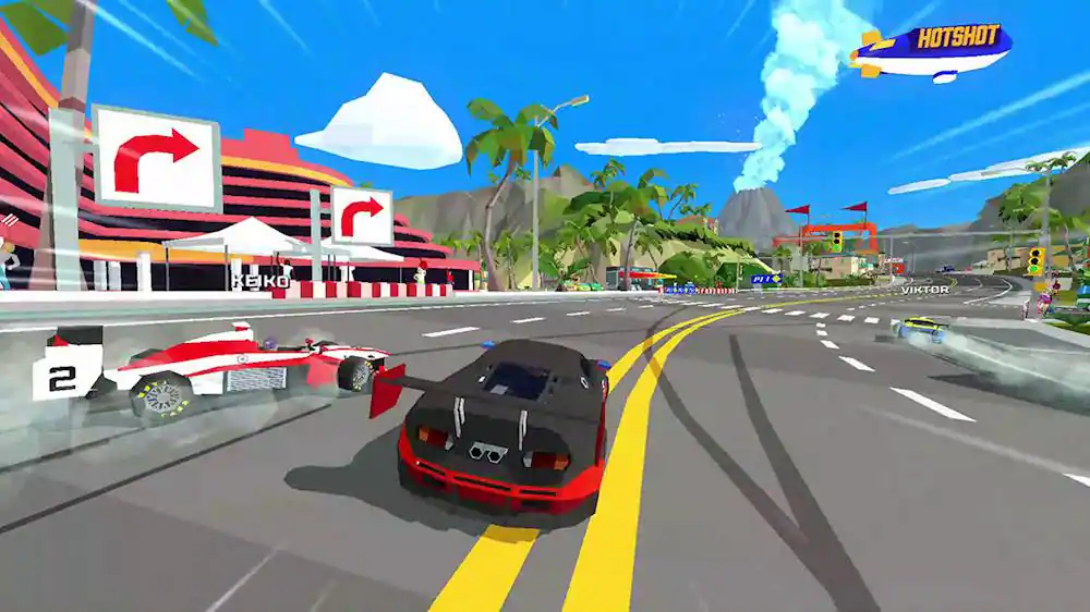 The image features a video game with a black car racing down a street, passing by a white car. The street is lined with buildings, and there are palm trees in the background. The game is set in a tropical location, possibly in Hawaii. The car is racing towards a gas station, and there are other cars visible in the scene. The image captures the excitement and action of the racing game. - E (Everyone)