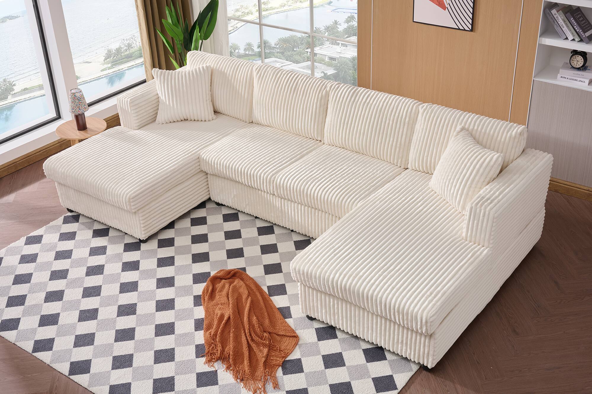 The text in the image is not clearly visible or legible. It appears to be part of a design or pattern on the wall, but it is not readable. Therefore, it cannot be grouped or corrected.