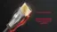 The image features a close-up of a Rocketfish cable with a gold connector, which is designed for Dynamic HDR and Enhanced Audio Return Channel (eARC).