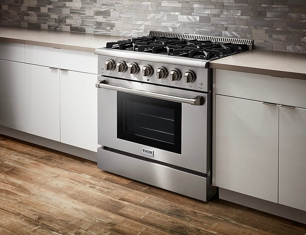 Left View: Thor Kitchen - 5.2 cu. ft. Freestanding Dual Fuel Liquid Propane Range - Stainless steel