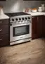 Left. Thor Kitchen - 4.55 cu. ft. Freestanding Gas Convection Range with Storage Drawer - Natural Gas - Stainless Steel.