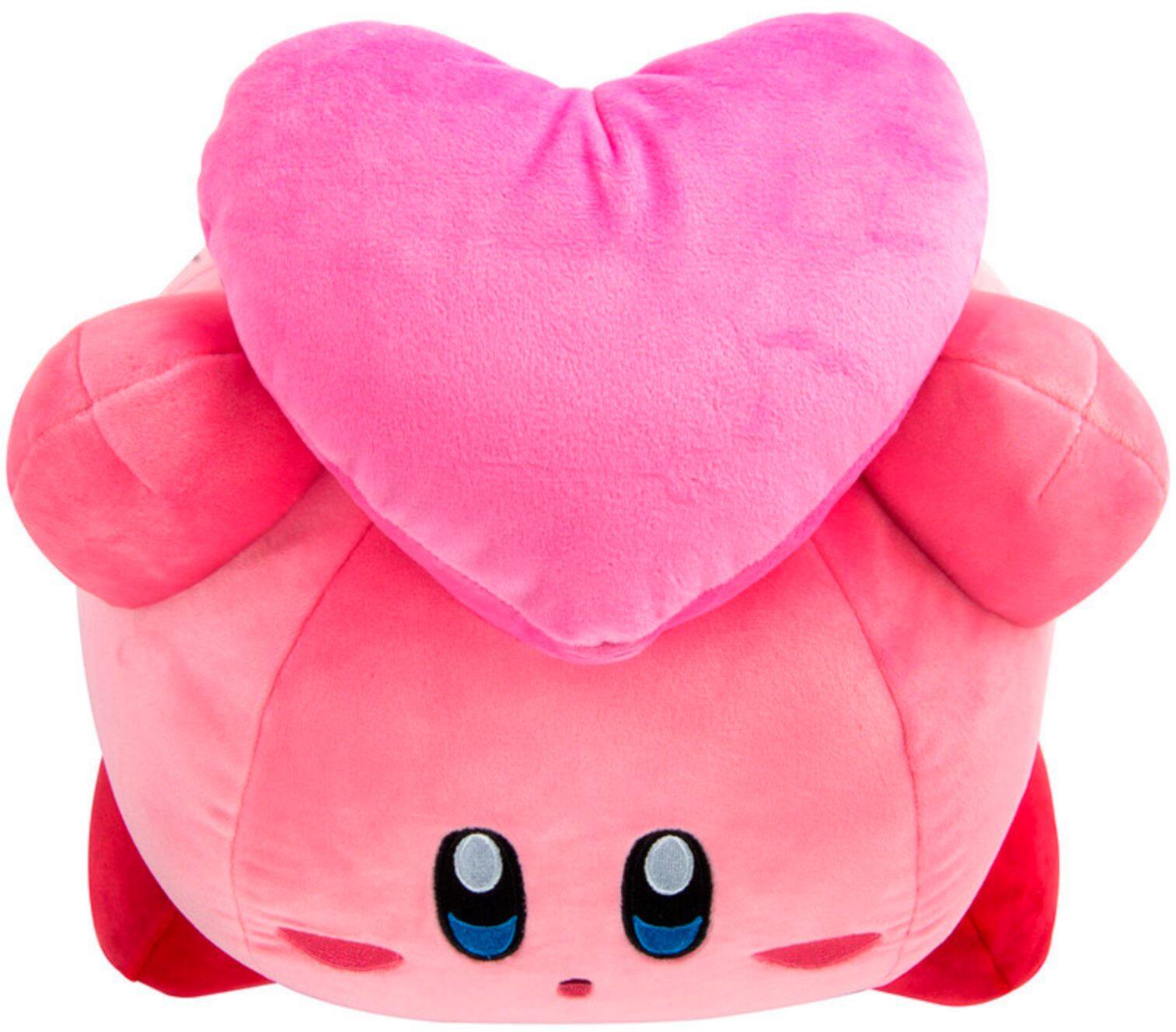 kirby holding heart plush