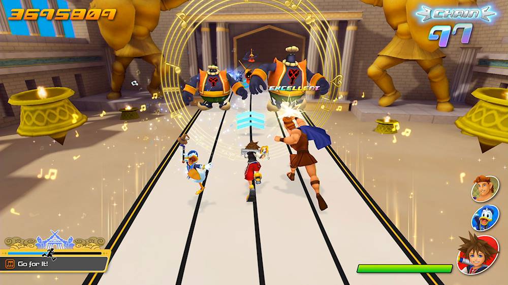 The image features a video game with a group of people playing in a square area. The game appears to be a mix of a fighting game and a sports game, as the characters are holding weapons and engaging in physical activities. The game is set in a city environment with a temple in the background. The characters are positioned throughout the scene, with some closer to the foreground and others further in the background. The game is likely an action-packed adventure that requires quick reflexes and strategic thinking.