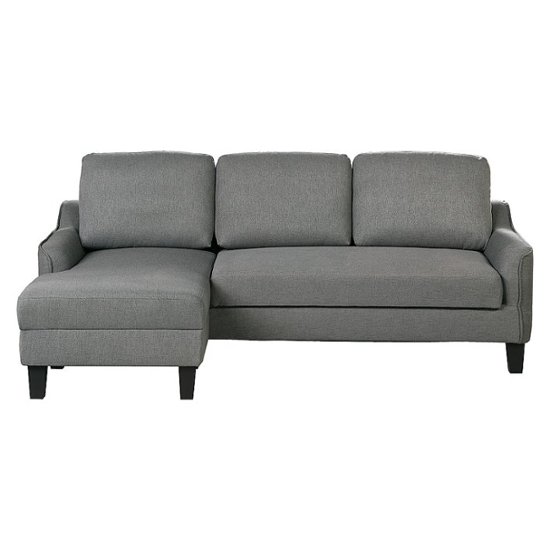 Front Zoom. OSP Home Furnishings - Lester Sofa with Chaise and Twin Sleeper in fabric with Black legs - Grey.