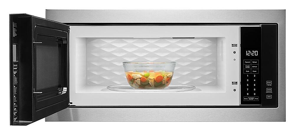 The text on the image reads: "1.1 CU. FT. Whigebol 12:20 Slim Trim Frame : 1000 W 12:20 1,000-Watt Cooking Power Tap-to-Open Door Whirlpool."