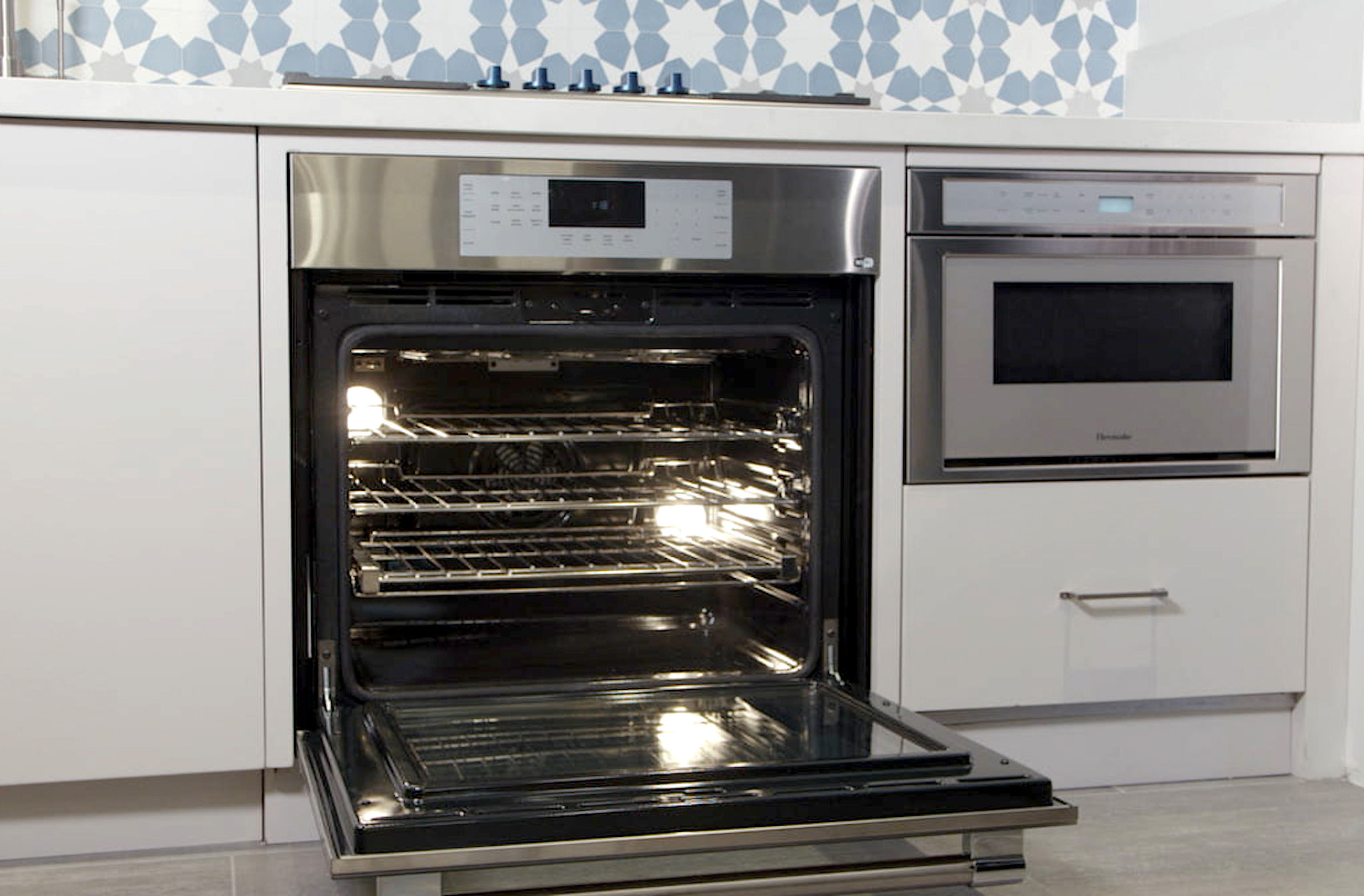 Angle View: Monogram - Statement Collection 30" Built-In Double Electric Convection Wall Oven - Stainless steel