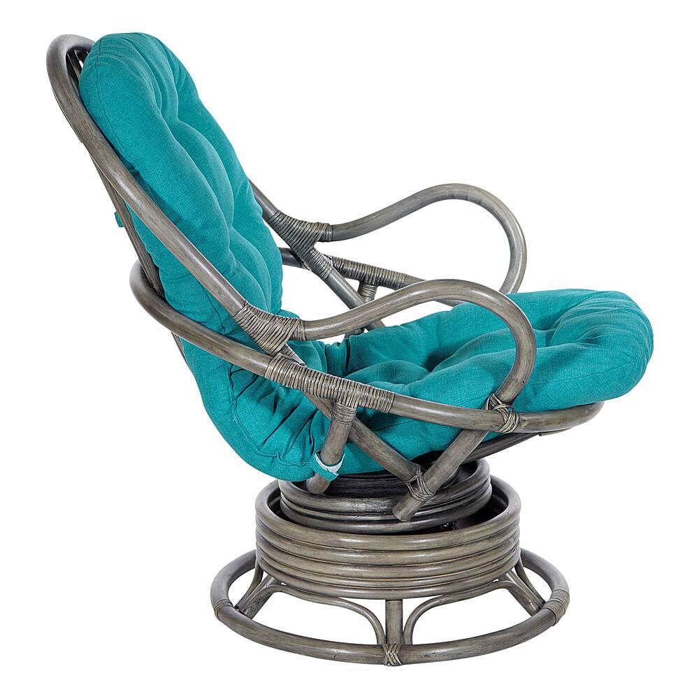 Left View: OSP Home Furnishings - Tahiti Rattan Swivel Rocker - Blue