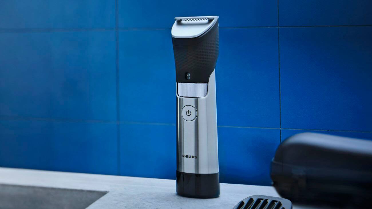 Left. Philips Norelco - Series 9000 Ultimate Rechargeable Beard and Hair Trimmer - Steel.