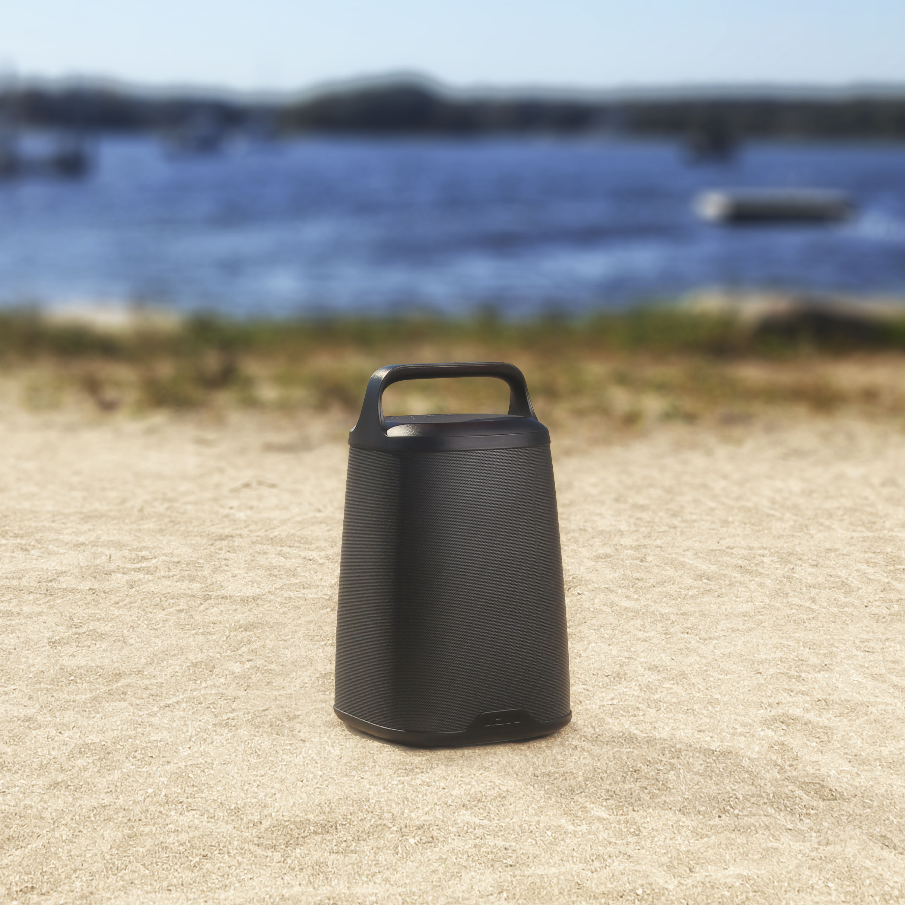 Left View: ION Audio - Solar Rock Multi-Sync Solar Rechargeable Outdoor Bluetooth Speaker with Multi-Sync - Gray