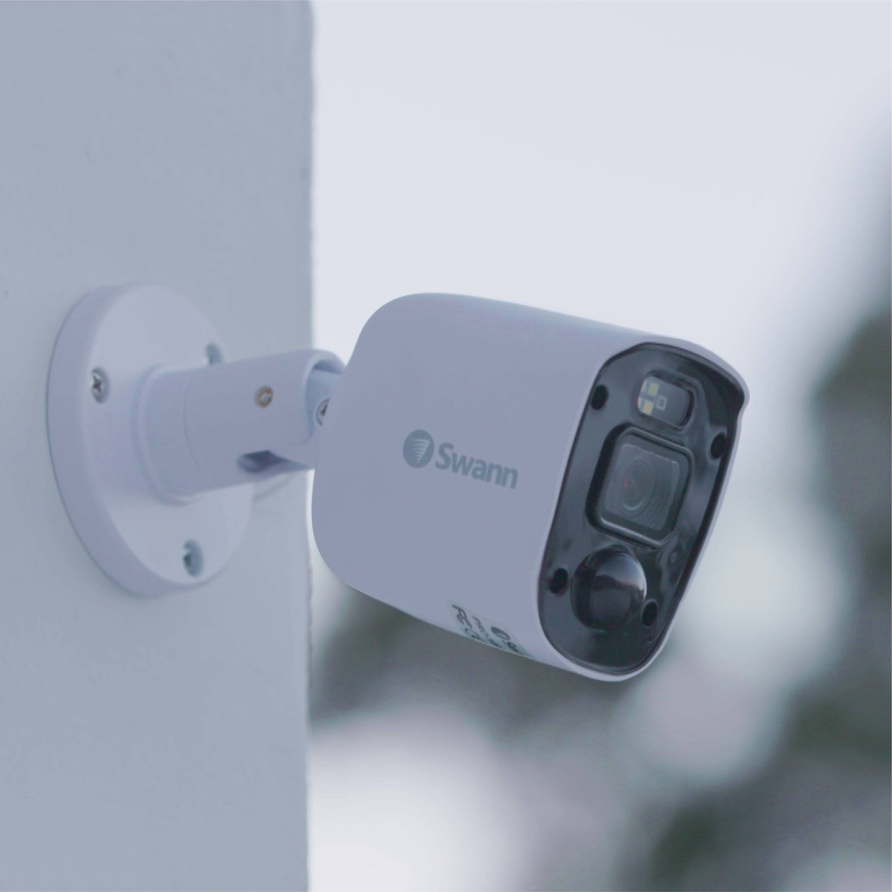 Left. Swann - Professional 8-Channel, 4-Camera Indoor/Outdoor Wired 1080p 1TB DVR Home Security Camera System - White.