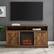 Alt View 11. Walker Edison - Farmhouse Tall Barndoor Soundbar Storage Fireplace TV Stand for Most TVs up to 65" - Rustic Oak.
