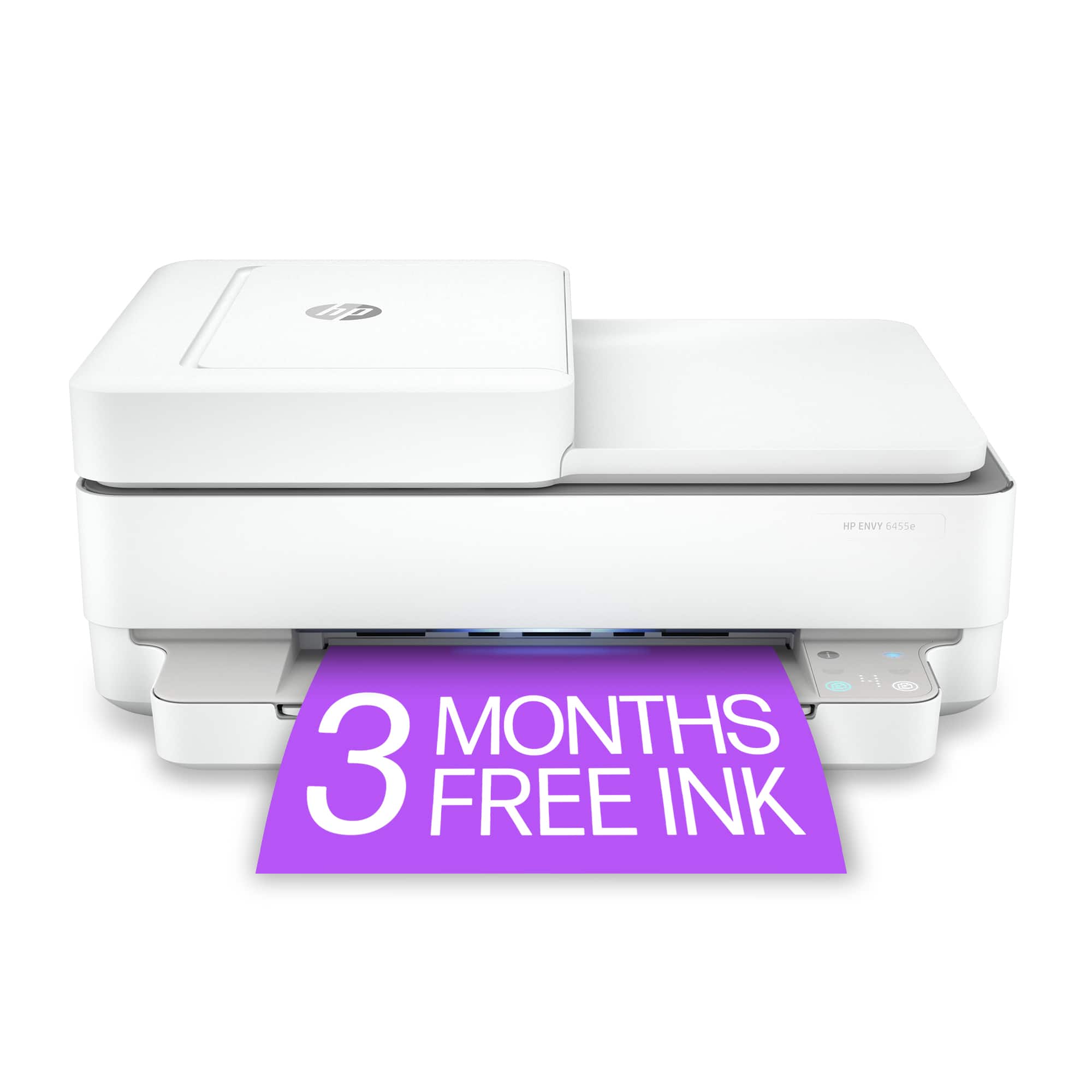 The image features a white HP printer with a purple sign on top of it. The sign reads "3 months 3 free ink," indicating that the printer comes with a three-month supply of ink included in the purchase. The printer is placed on a white background, making it the main focus of the image.