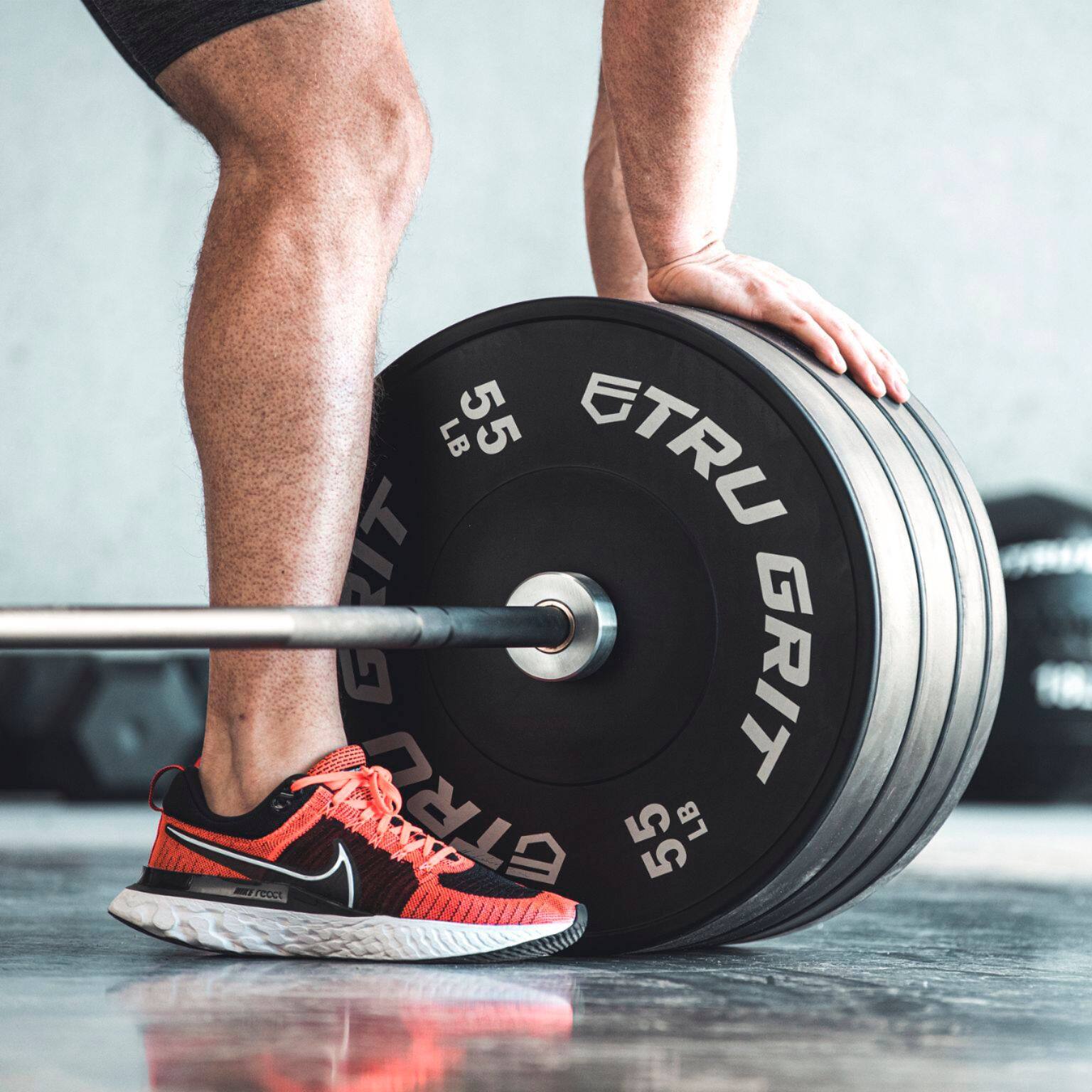 Left View: Tru Grit - Single Bumper Plate 45LB - Black