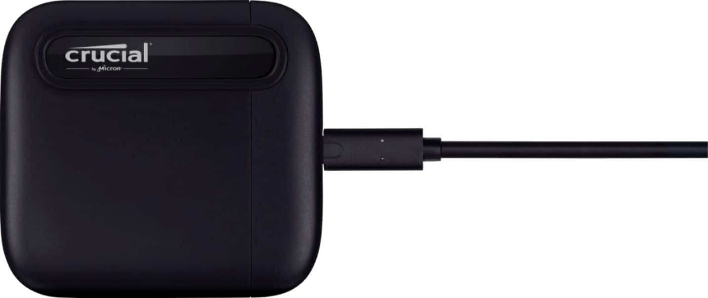 Left. Crucial - X6 SE 2TB External USB-C/USB-A Portable SSD - Black.