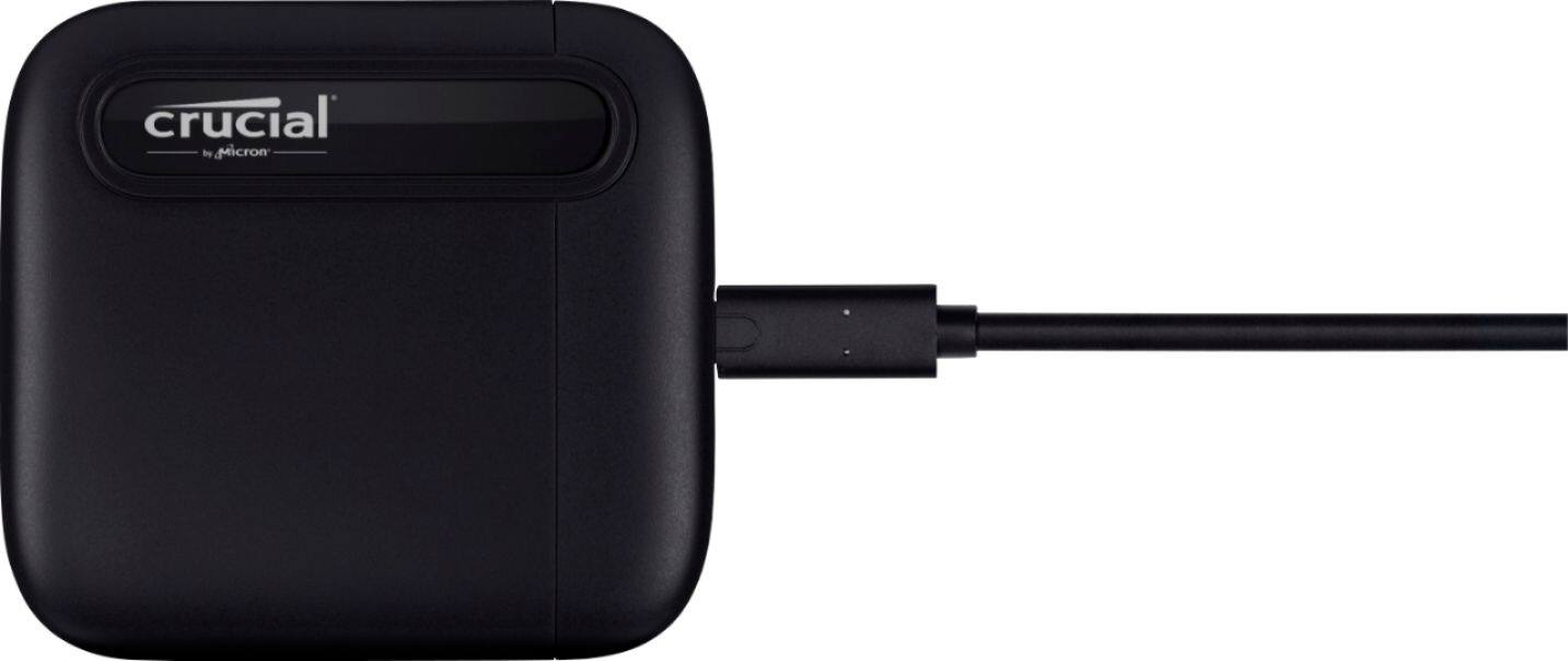 Left. Crucial - X6 SE 2TB External USB-C/USB-A Portable SSD - Black.