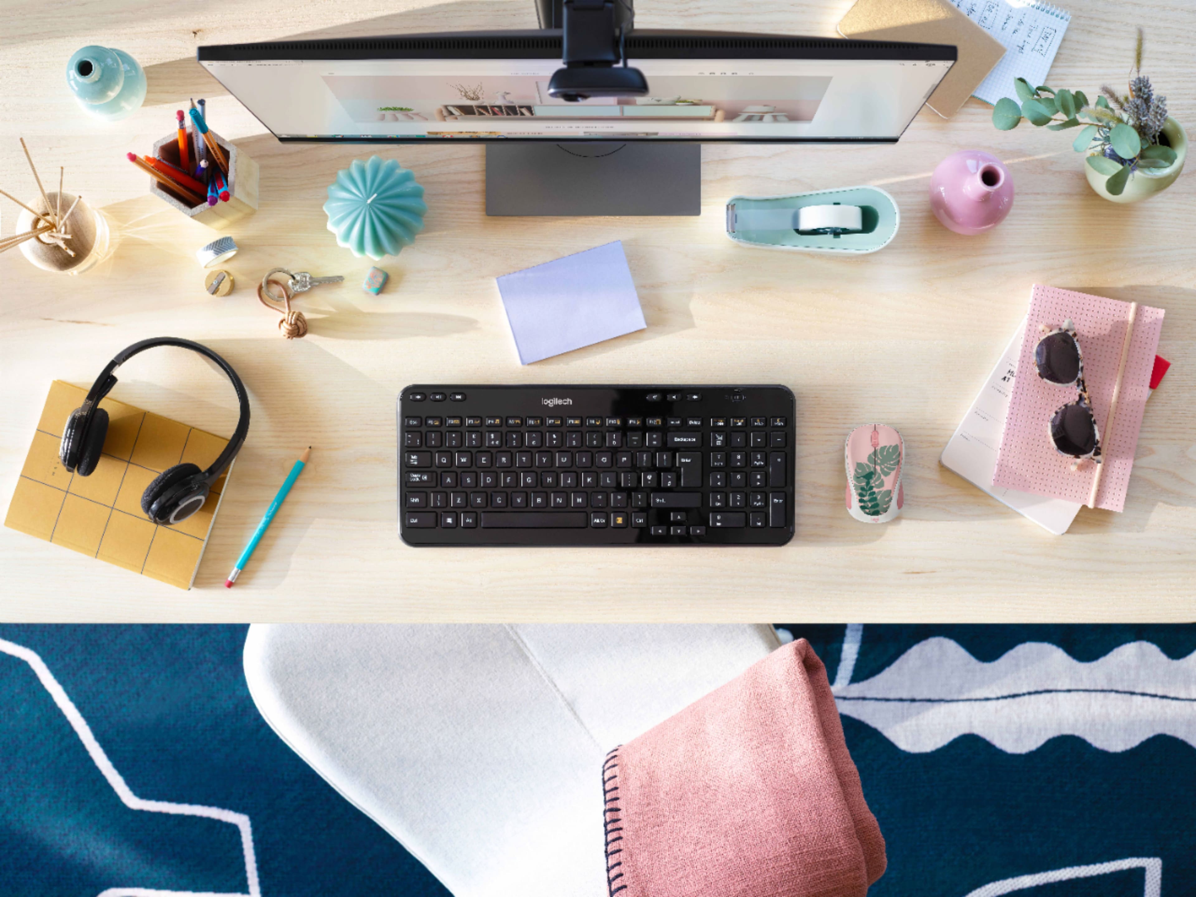 The text on the image reads: "E S i logiliech - + . - -- -. - -- N - - - . - d.. E : - - 4 . - - - - - - - . : Y 4 - d - - + - 4 1 - - - - - - a - - . - - - + - - - - 2 a - - 4 . - a 6 - 4 - - + . - - . 4 - + a . -. - - a - - - - . - - a -- - . . + . -". This text appears to be a random combination of letters and numbers, and it does not form any coherent words or phrases.