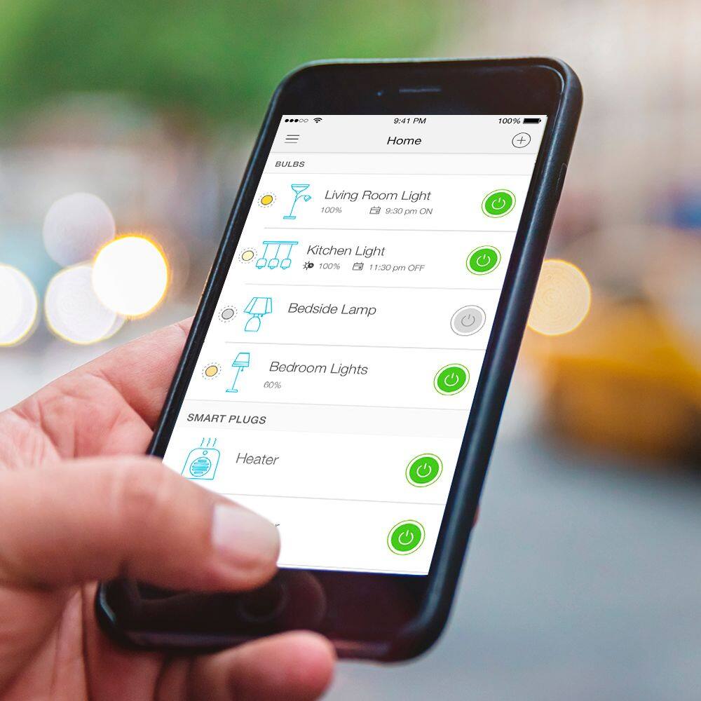 The text on the image is grouped and corrected as follows:
09:41 PM 100% Home + BULBS Living Room Light 100% 9:30 pm ON Kitchen Light 100% I 11:30 pm OFF Bedside Lamp Bedroom Lights 60% SMART PLUGS Heater