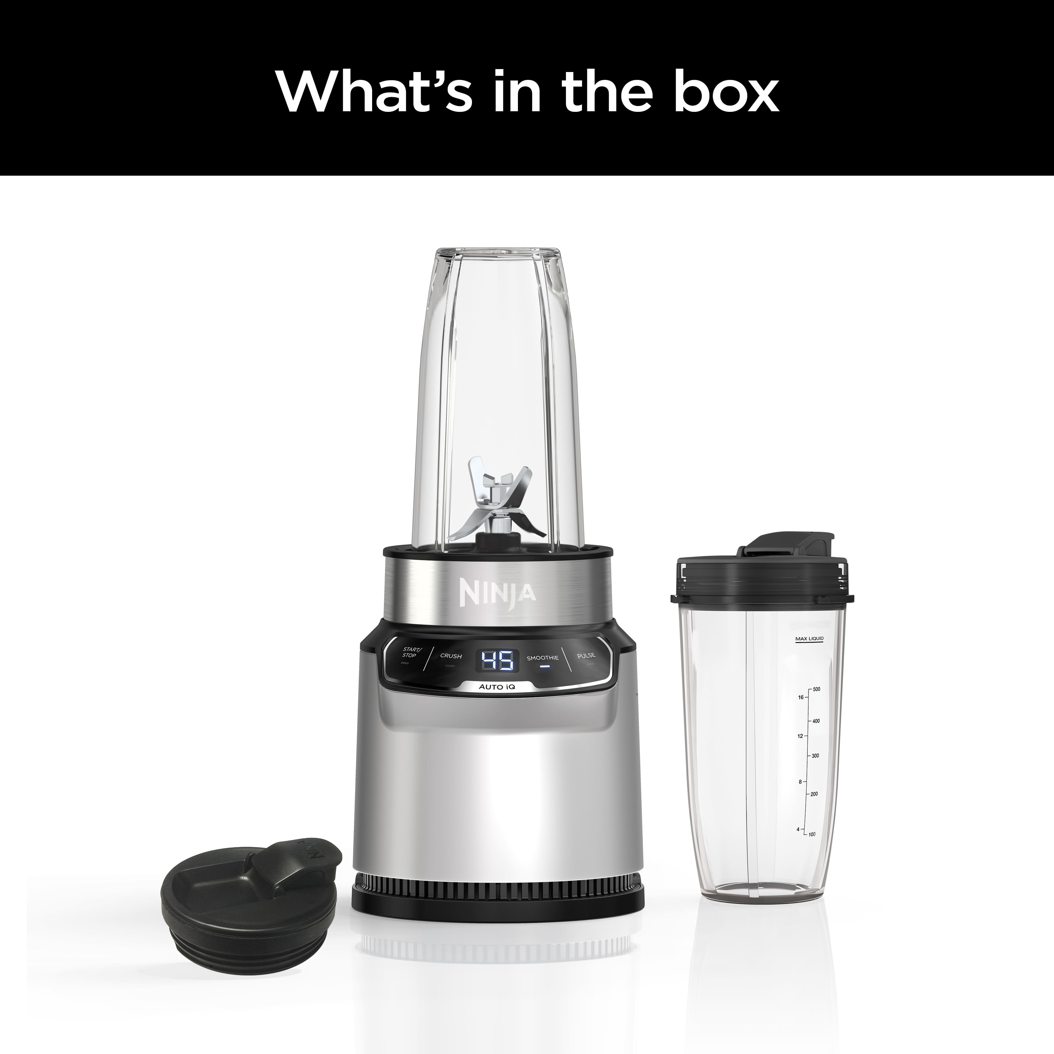 The image features a Ninja blender and a Ninja cup. The blender is silver and has a black lid. The cup is also silver and has a black lid. The blender is sitting on top of the cup, and both are placed on a white background.