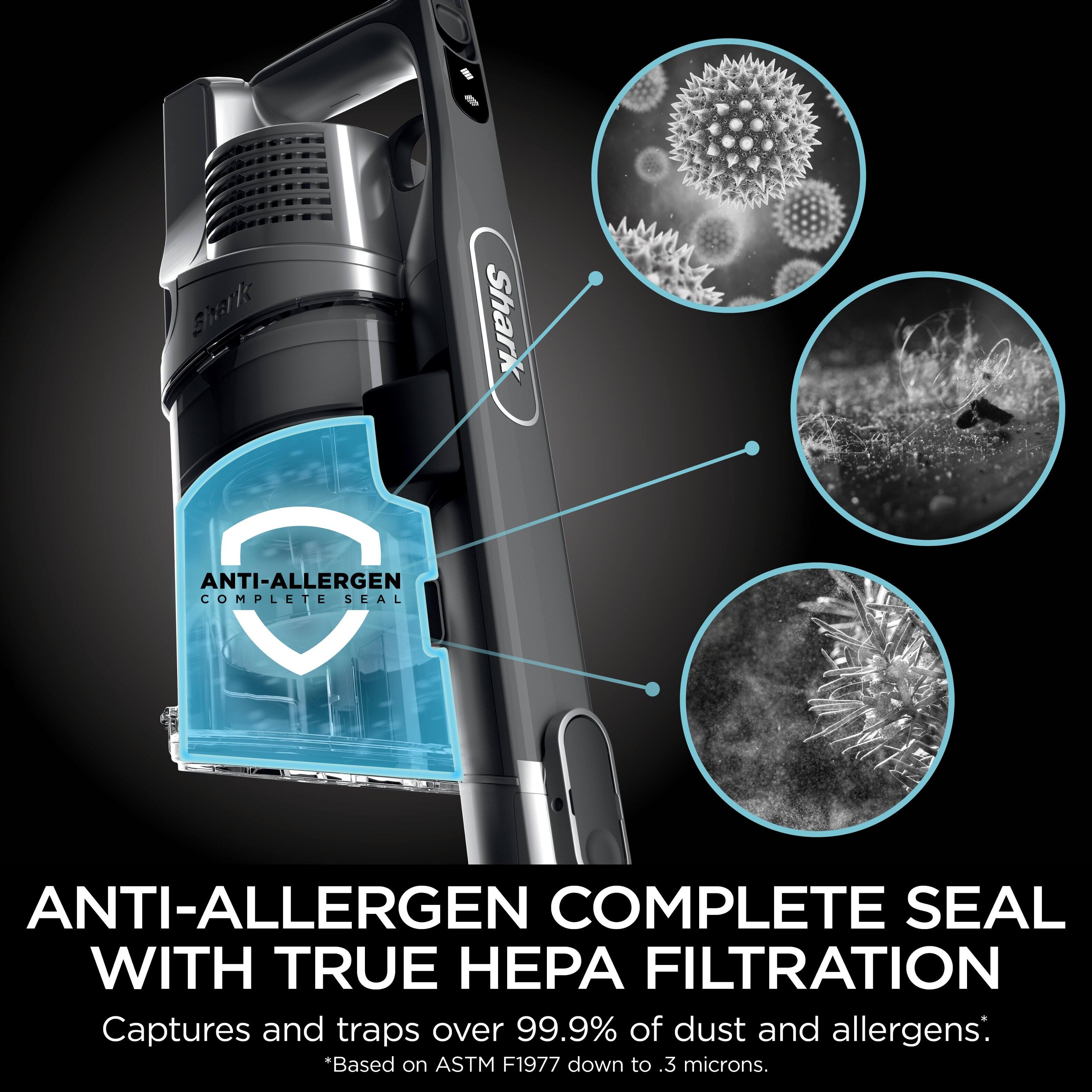 The text on the image is grouped and corrected as follows:
"Shark Anti-Allergen Complete Seal with True HPA Filtration captures and traps over 99.9% of dust and allergens. Based on ASTM F1977 down to .3 microns."