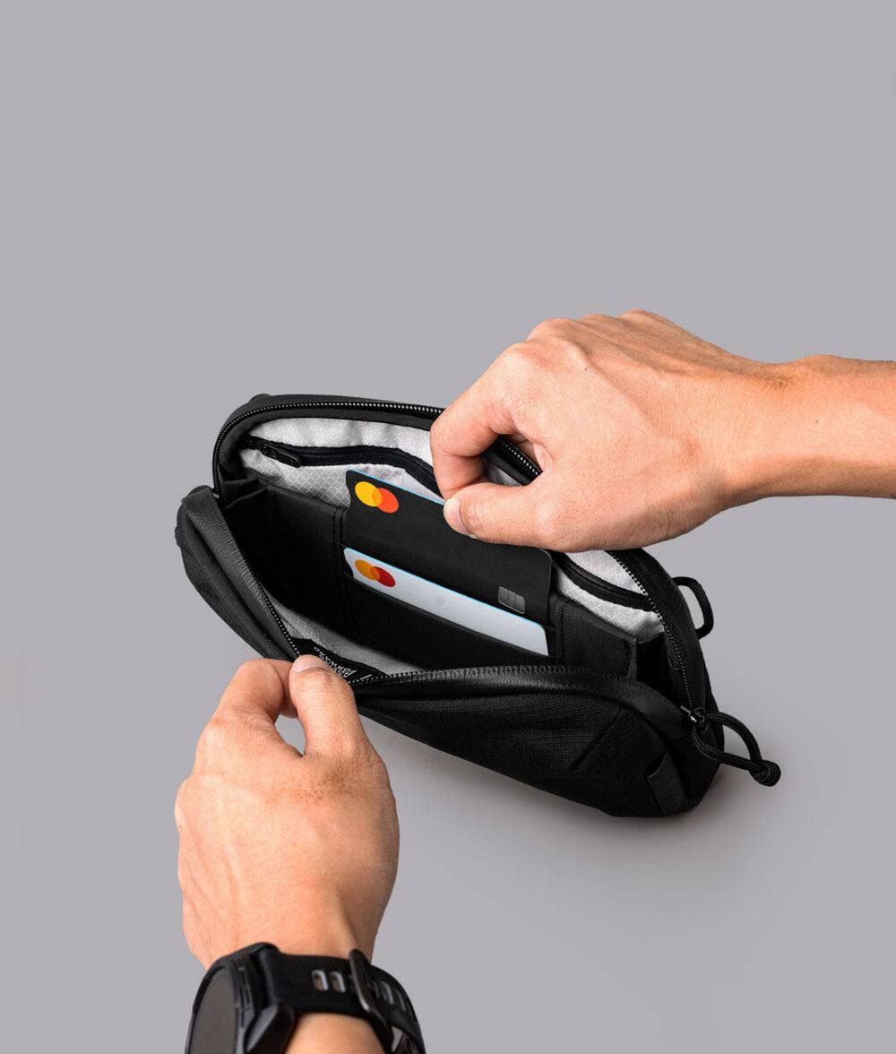 Alt View 2. ALPAKA - Flight Pouch Pro 0.7L Men's Carry-All & Organizer Clutches;Crossbody Bag for Men with RFID Blocking, Passport Holder - Black | Axoflux 400D Ripstop Nylon.