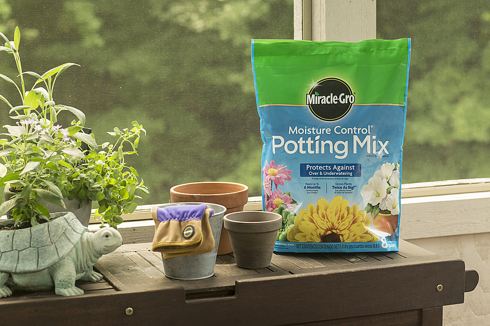 Left View: Miracle-Gro Moisture Control Potting Mix 2-pack - Black