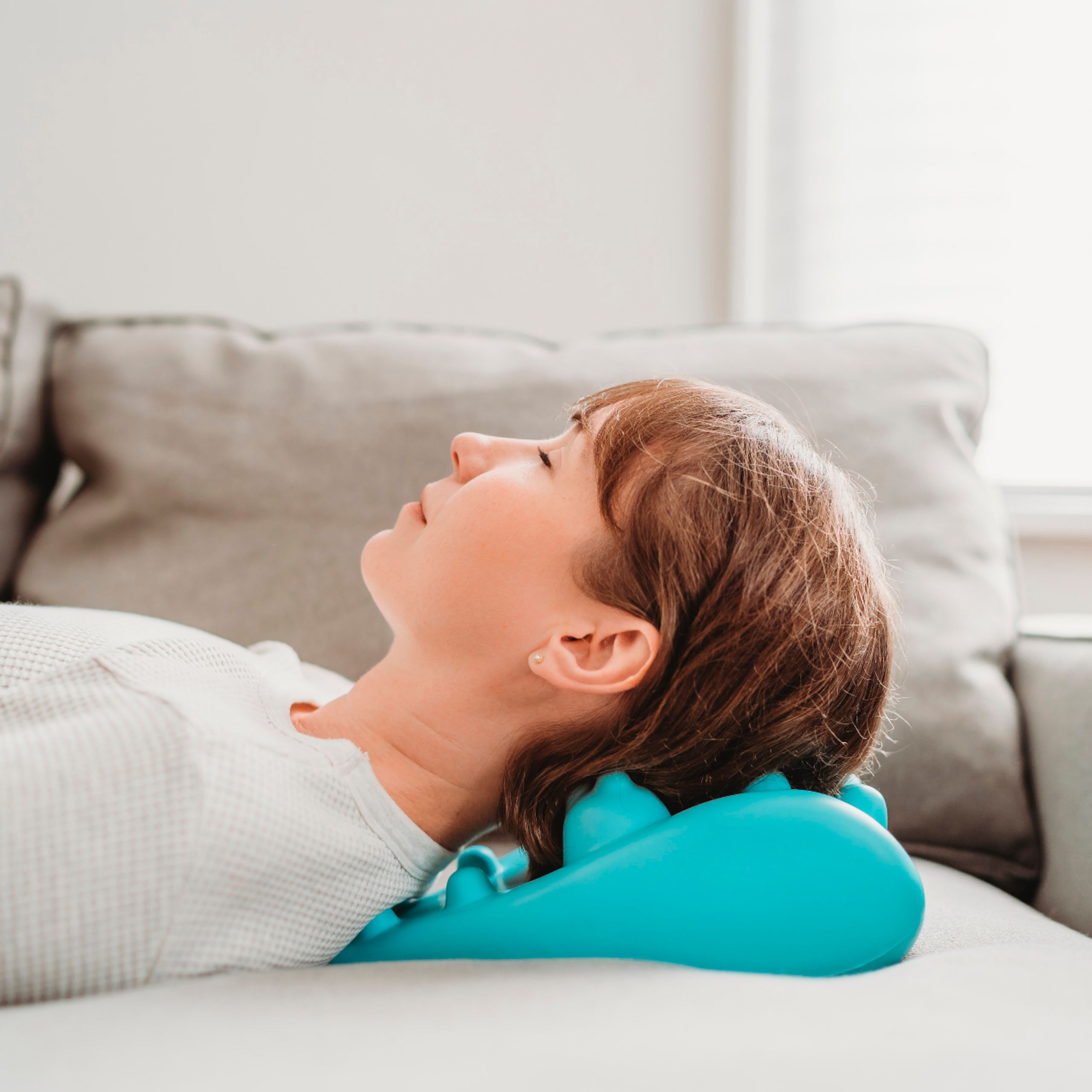 Left View: Kanjo - Acupressure Neck Pain Relief Cushion - Blue