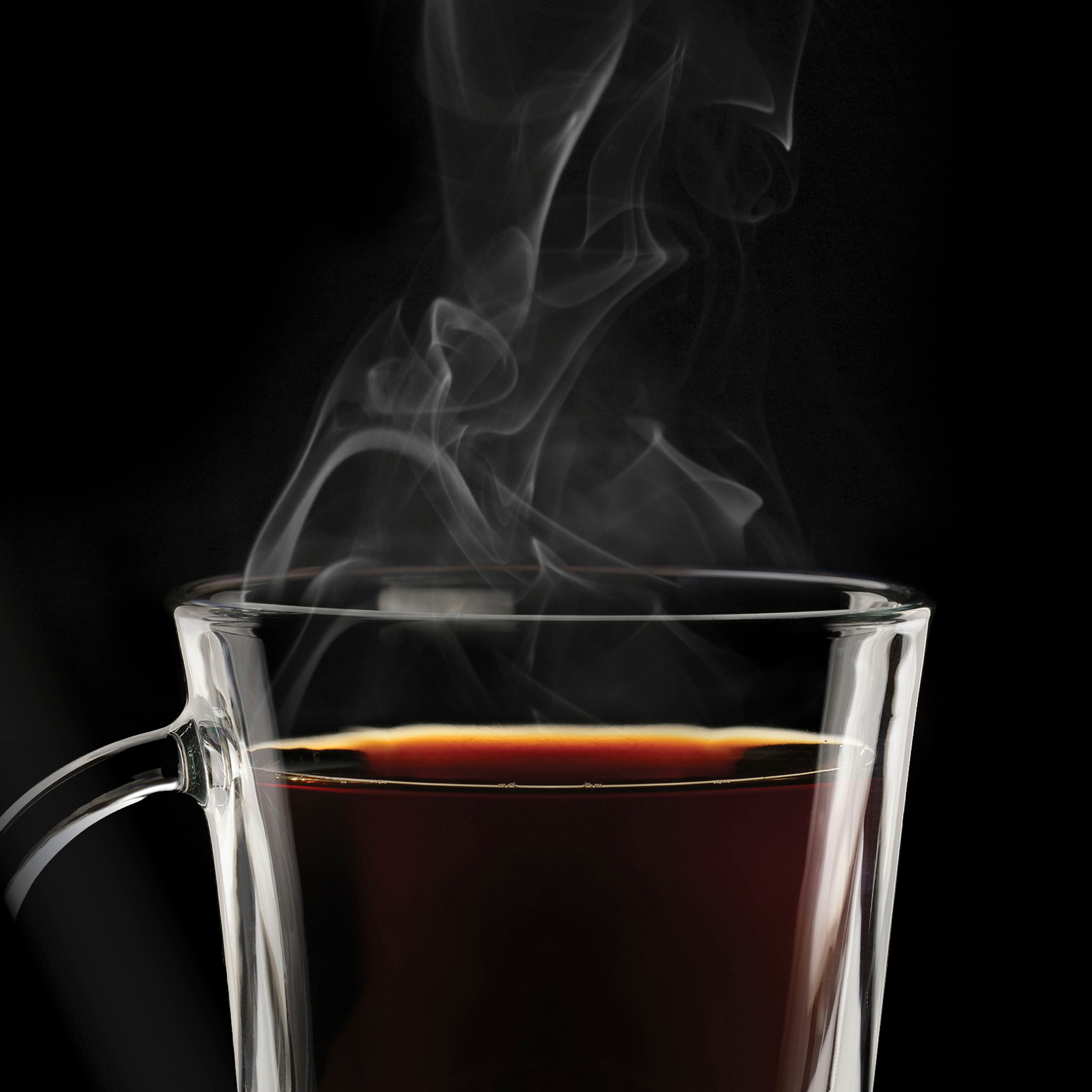 The image features a Ninja coffee maker with a built-in frother, removable water reservoir, K-Cup adapter, and a Ninja Smart Scoop. The coffee maker is displayed on a white background, with the coffee maker and its accessories prominently visible. The Ninja Smart Scoop is a unique feature of this coffee maker, as it allows for easy and precise scooping of coffee grounds. The 12-cup glass carafe is also included with the coffee maker, providing ample space for brewing and serving coffee.