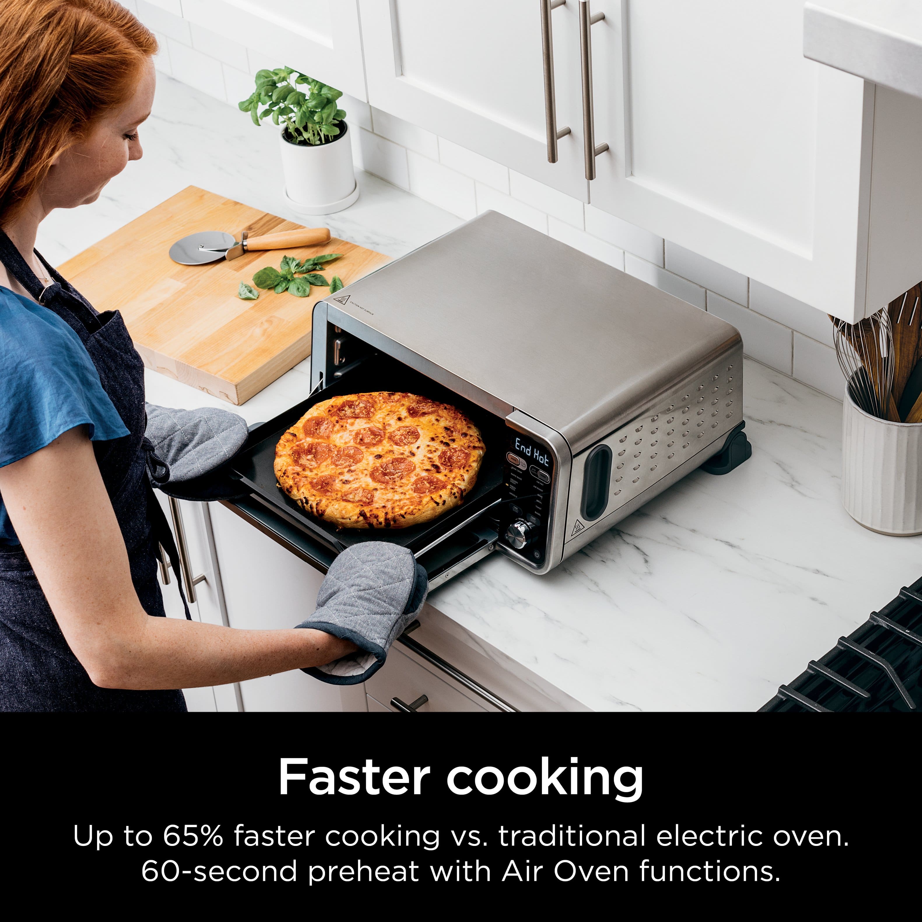 The text on the image states that the woman is cooking a pizza using a faster cooking method, which is up to 65% faster than traditional electric ovens. Additionally, the cooking process includes a 60-second preheat with Air Oven functions.