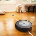 Alt View Zoom 1. iRobot - Robot Roomba j7+ (7550) Self-Emptying Robot Vacuum – Identifies and avoids obstacles like pet waste & cords - Graphite.